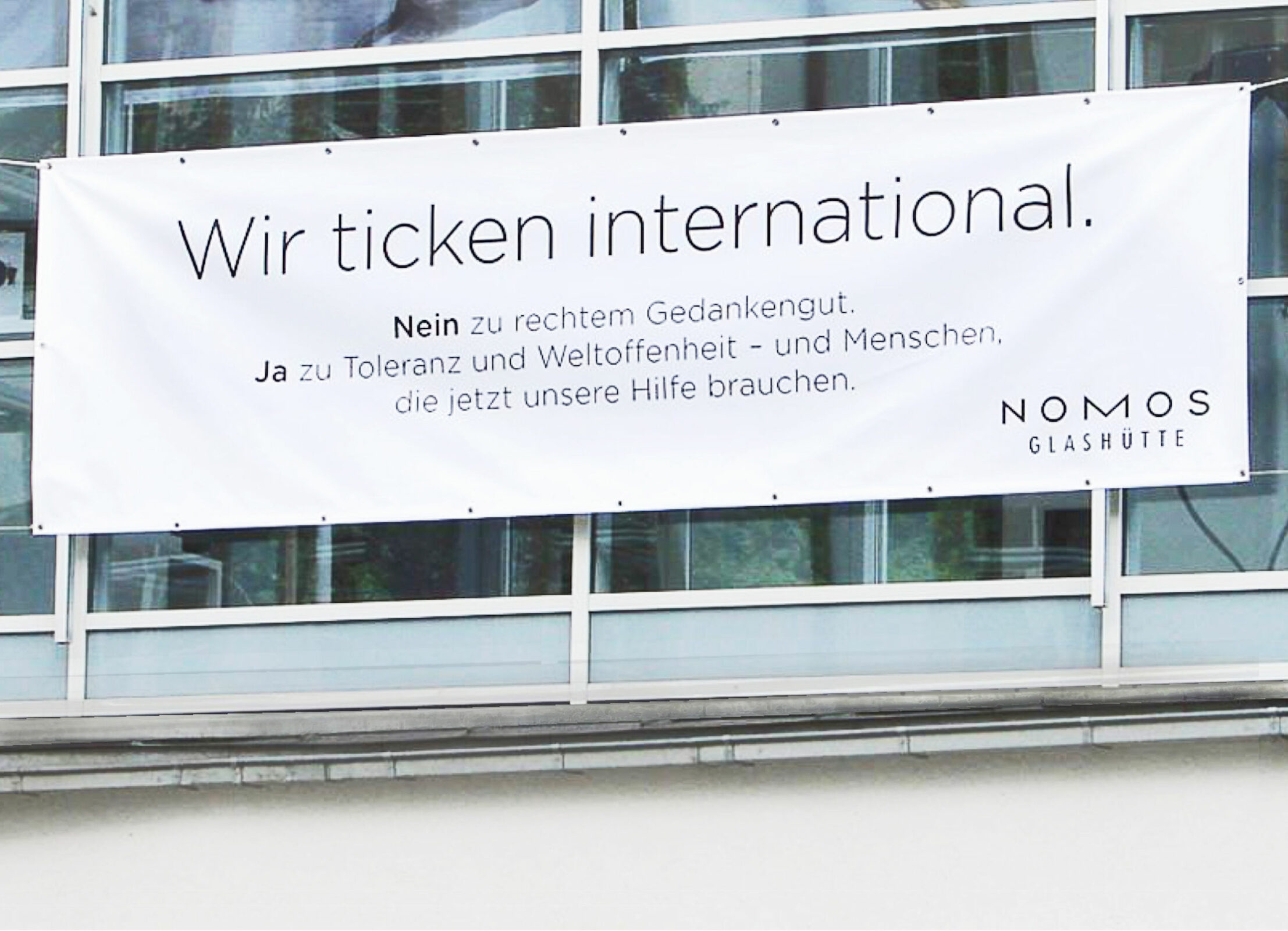 Nomos Banner Fluechtlinkgskrise Wir ticken international